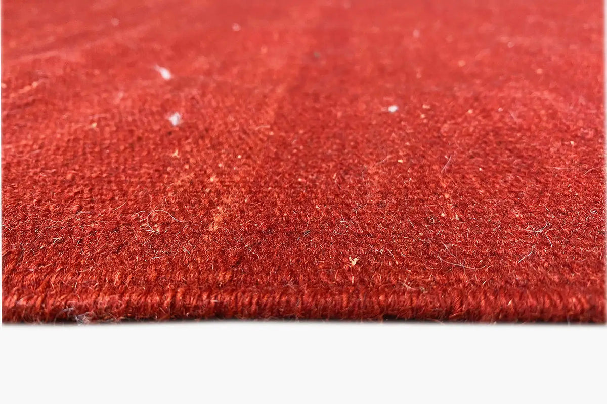 Qashqai kilim rug in red, close-up of the fine texture