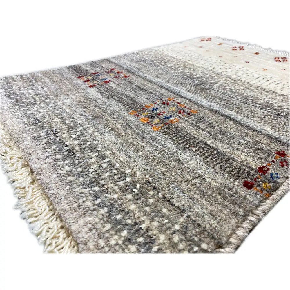 Gabbeh rug 57x41 cm, woven texture detail, mottled gray with red and multicolored patterns