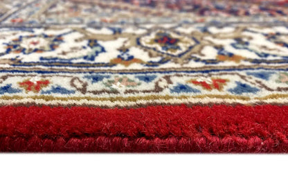 Bidjar runner bottom edge with red pile, beige-brown patterned border and fringe