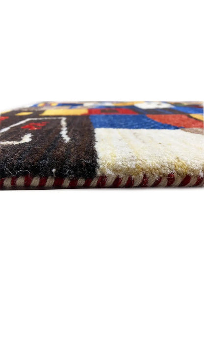 Gabbeh rug 194x140 cm, close-up of the pile surface and colorful selvedge
