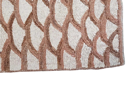 Close-up of a carpet pattern: white arcs with brown shading