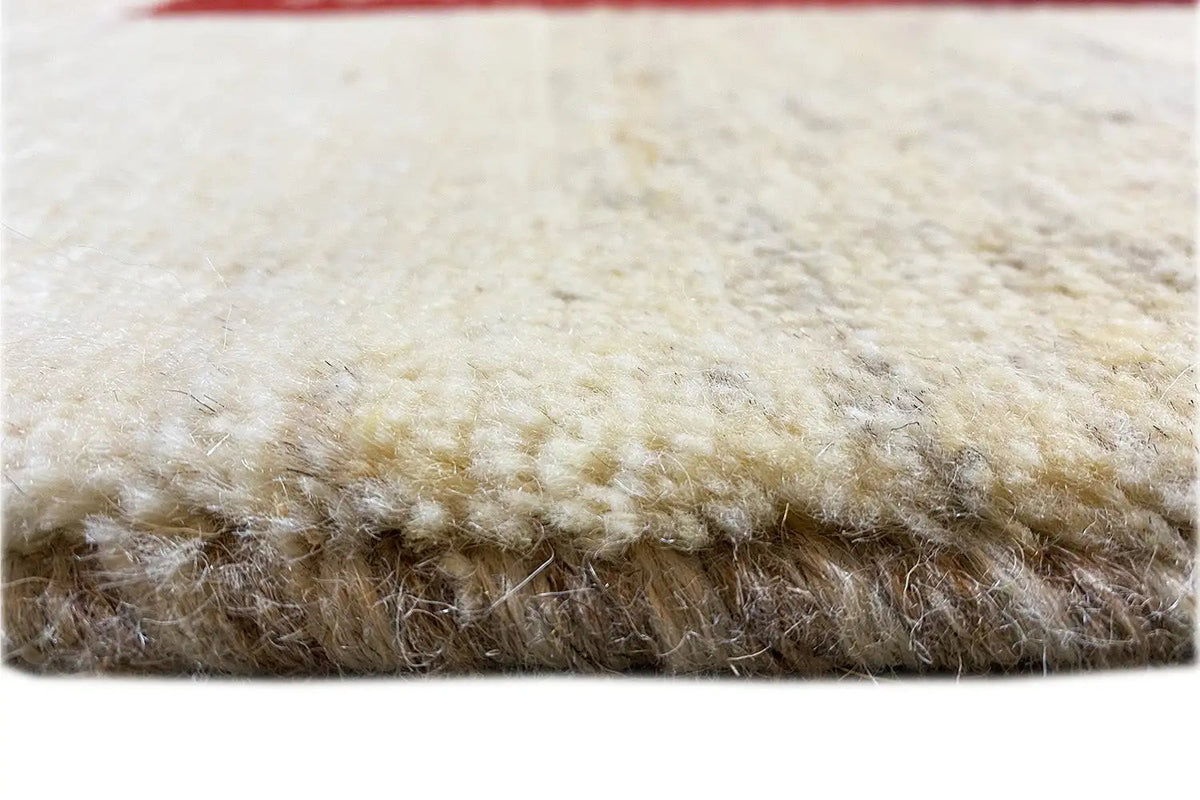 Gabbeh rug 305x200 cm, pile height detail: soft, cream-colored rug edge
