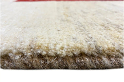 Gabbeh rug 305x200 cm, pile height detail: soft, cream-colored rug edge