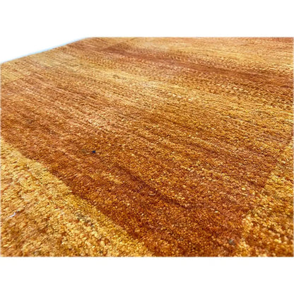 Gabbeh Lori rug, detail of the orange-brown wool surface