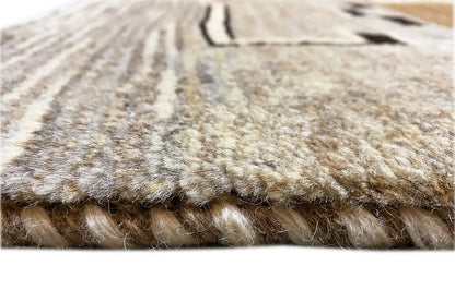 Gabbeh rug: Detail of the fringe and pile surface in light beige