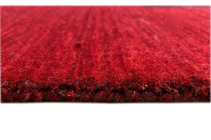 Gabbeh rug detail: dense red pile, 242×172 cm