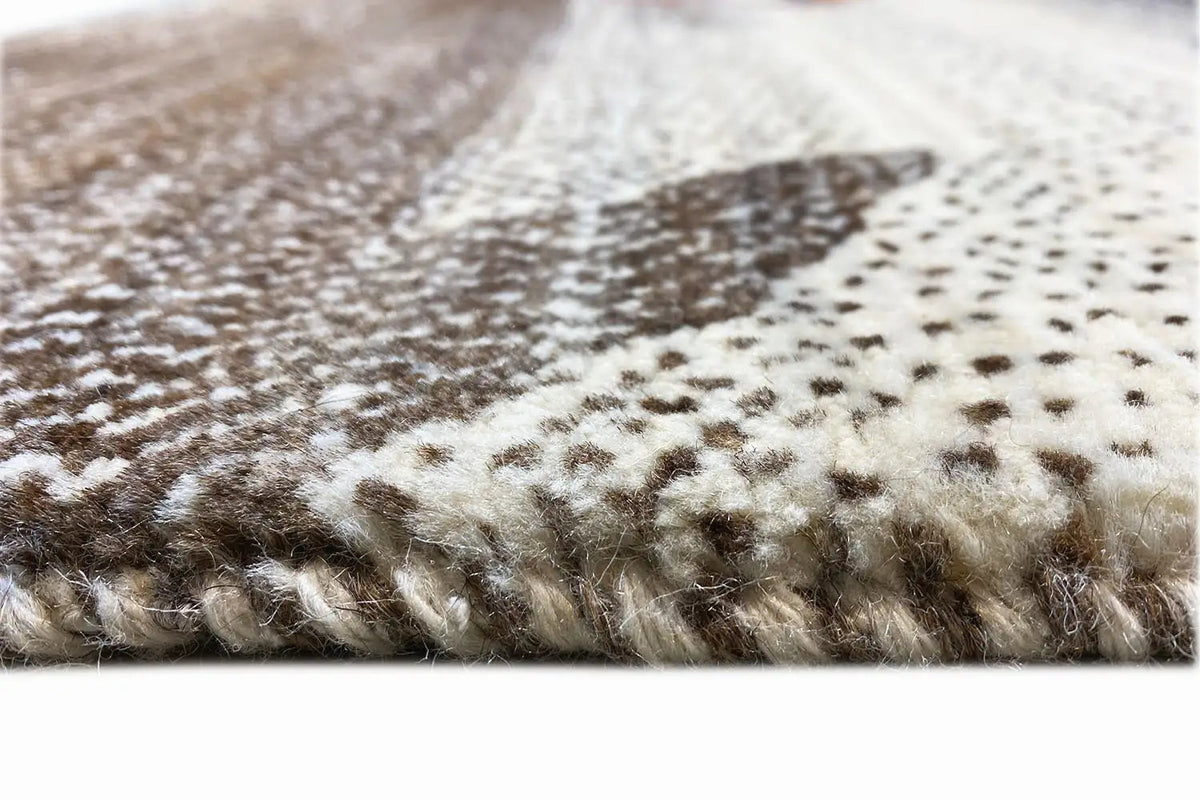 Gabbeh rug: detailed pile texture in beige and dark brown