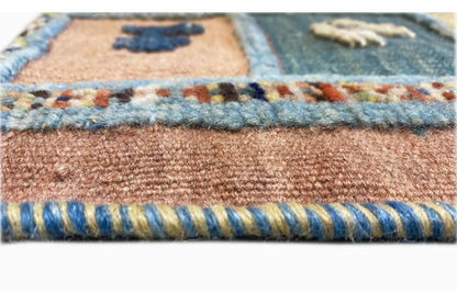 Kilim rug detail of the woven edge with multicolored edging and brown pile