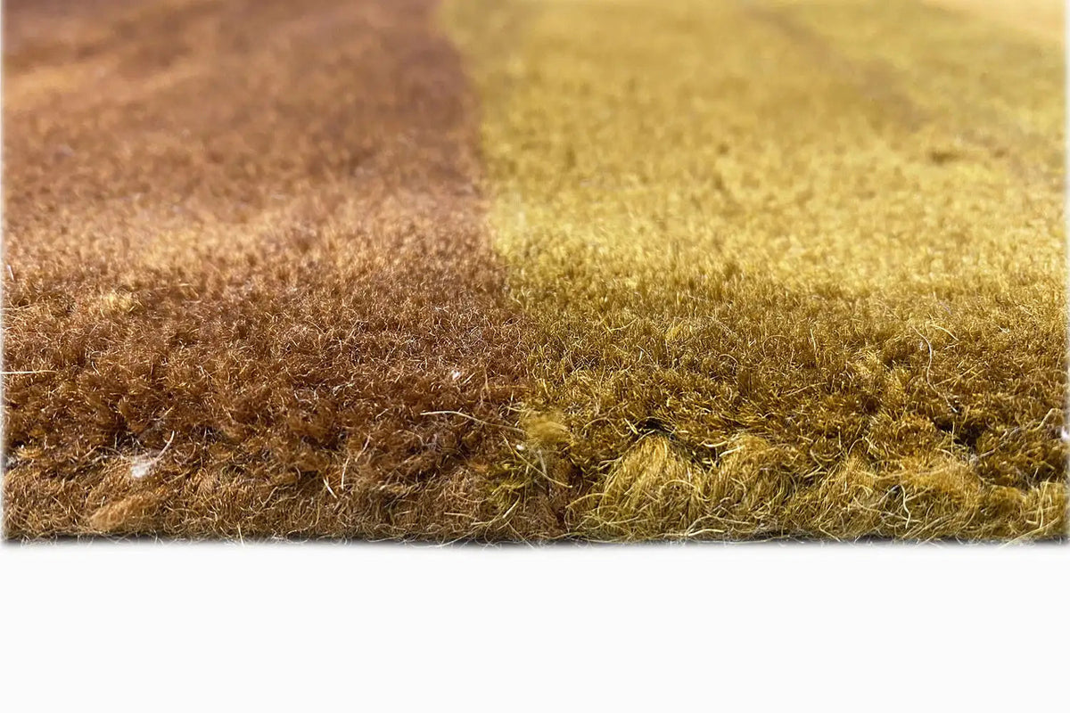 Hand-tufted rug 150x200 cm, detail of the pile texture in brown and green-yellow