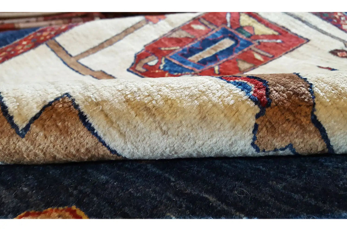 Qashqai exclusive rug close-up: pile and knotted edge with colorful patterns