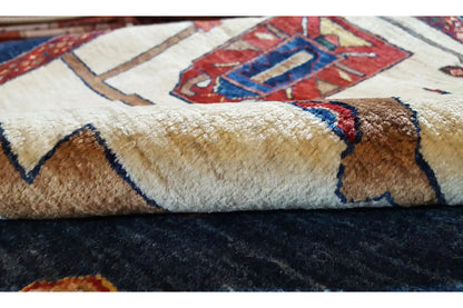 Qashqai exclusive rug close-up: pile and knotted edge with colorful patterns