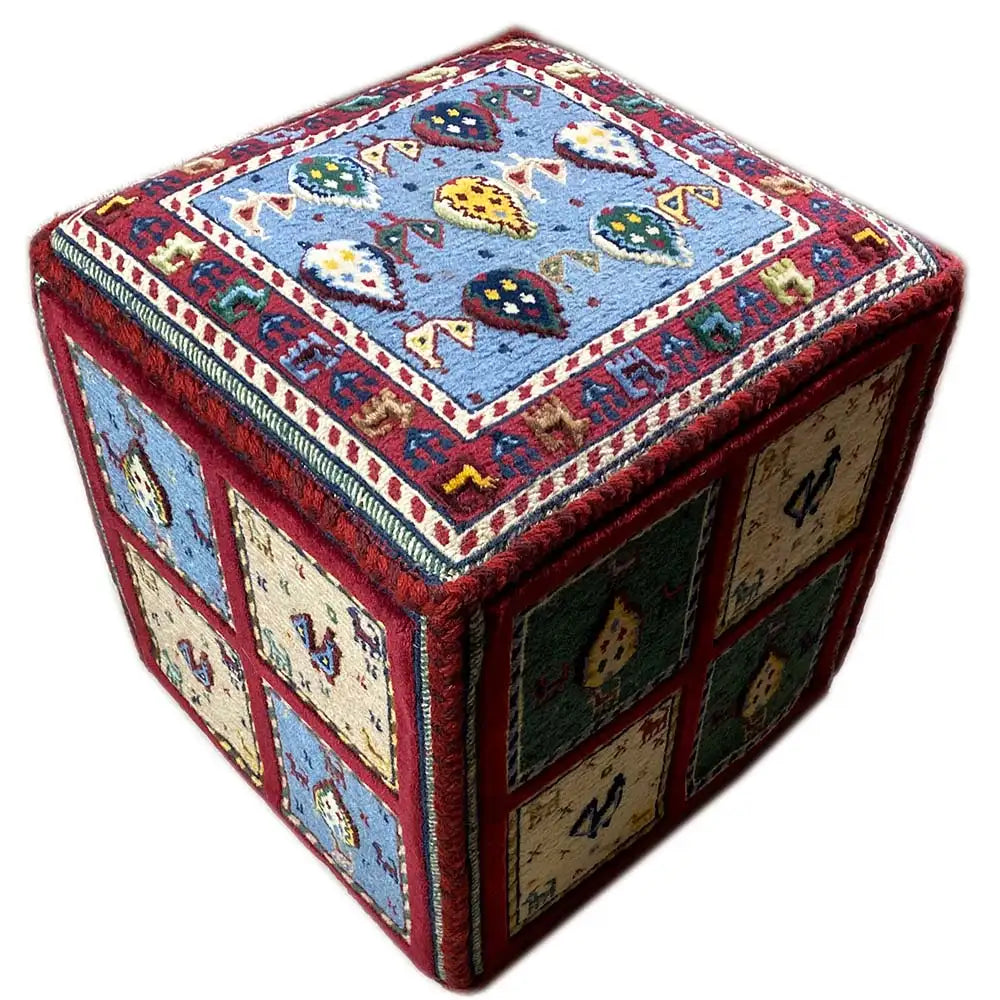 Carpet cube diagonal: blue top-side pattern with colorful figures and red edges