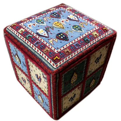 Carpet cube diagonal: blue top-side pattern with colorful figures and red edges