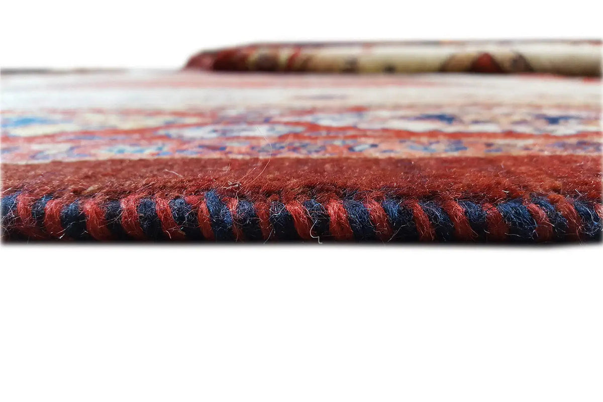 Rug edge with a multicolored twisted fringe finish
