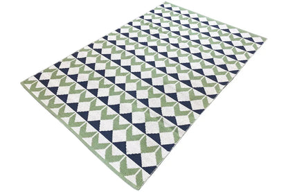 Square kilim rug with diamond and triangle patterns in green, dark blue, and white