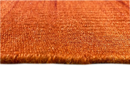 Kilim dhurrie rug with a finely textured orange-red woven surface