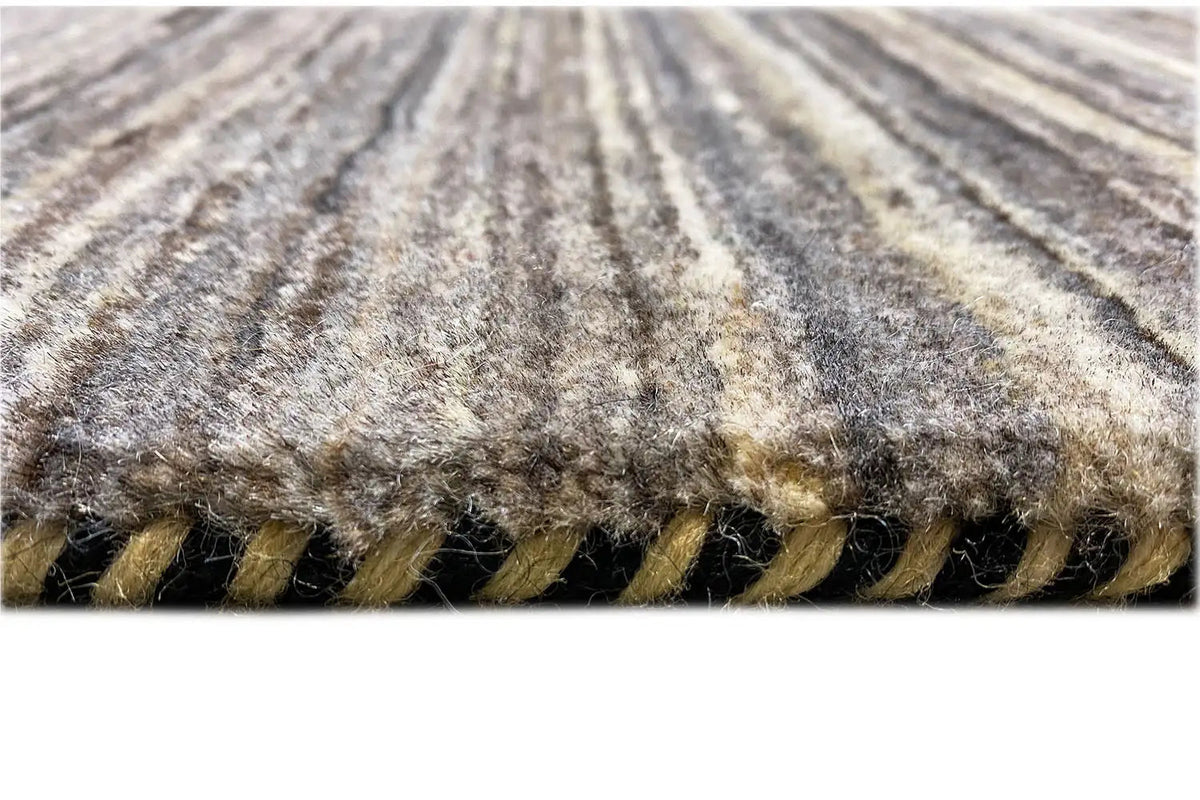 Gabbeh-Lori rug with fringed edges and a woven texture