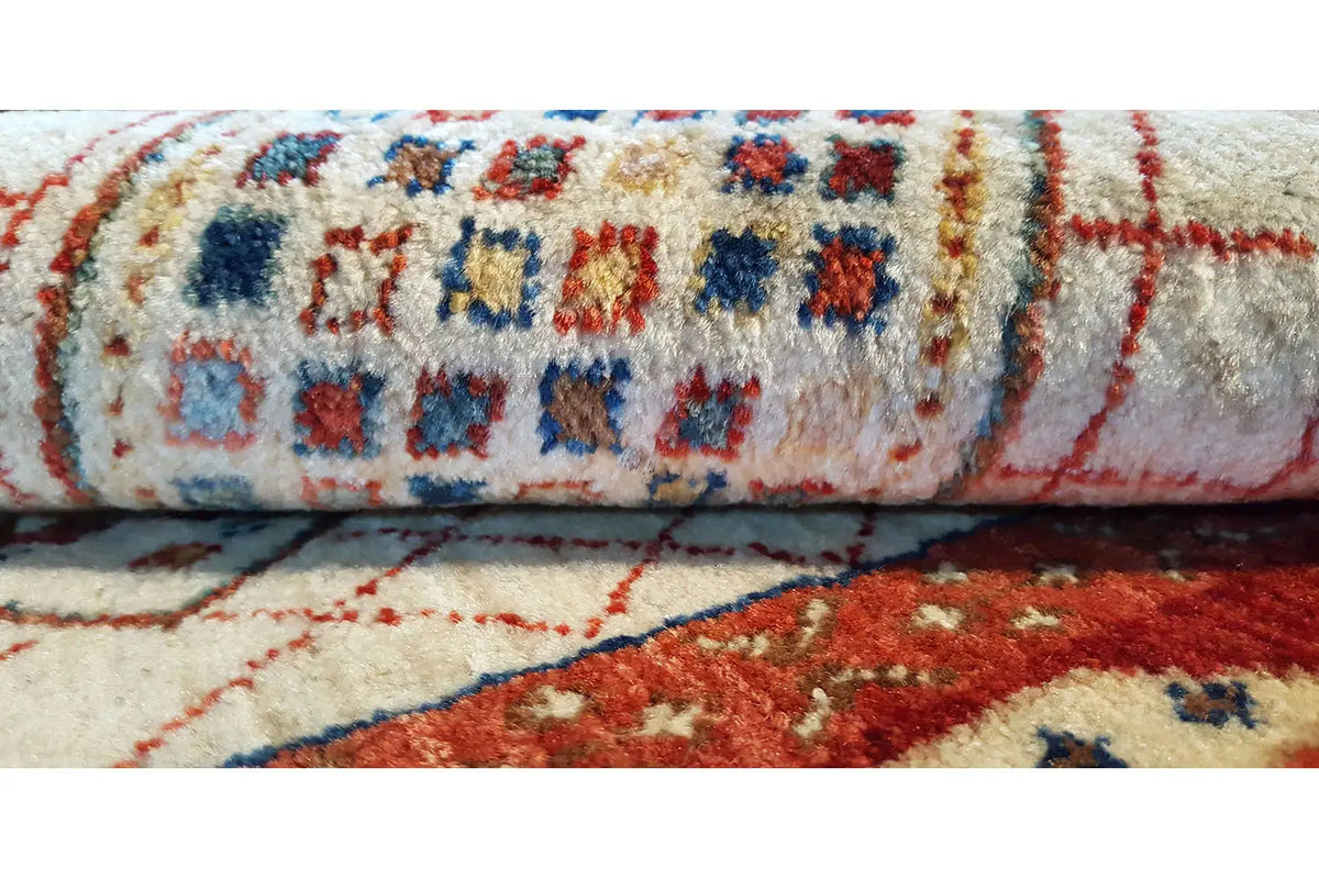 Carpet detail with multicolored patterns, relief-like pile surface