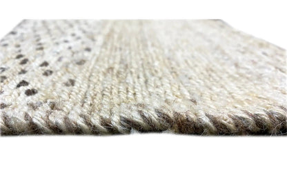 Kelim Qashqai rug close-up of the pile surface, light beige with dark dots