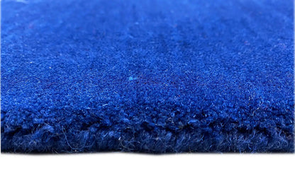 Gabbeh rug 204x149 cm, detail of the blue pile and neat edge finish seam