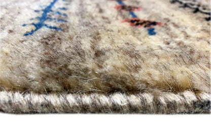 Gabbeh Lori rug with a dense pile surface and fringe trim along the sides