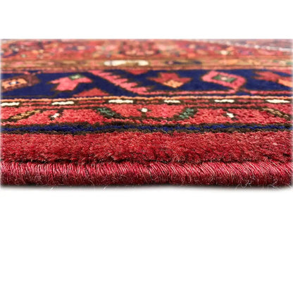Hamadan rug with red pile and an all-over pattern; visible fringes