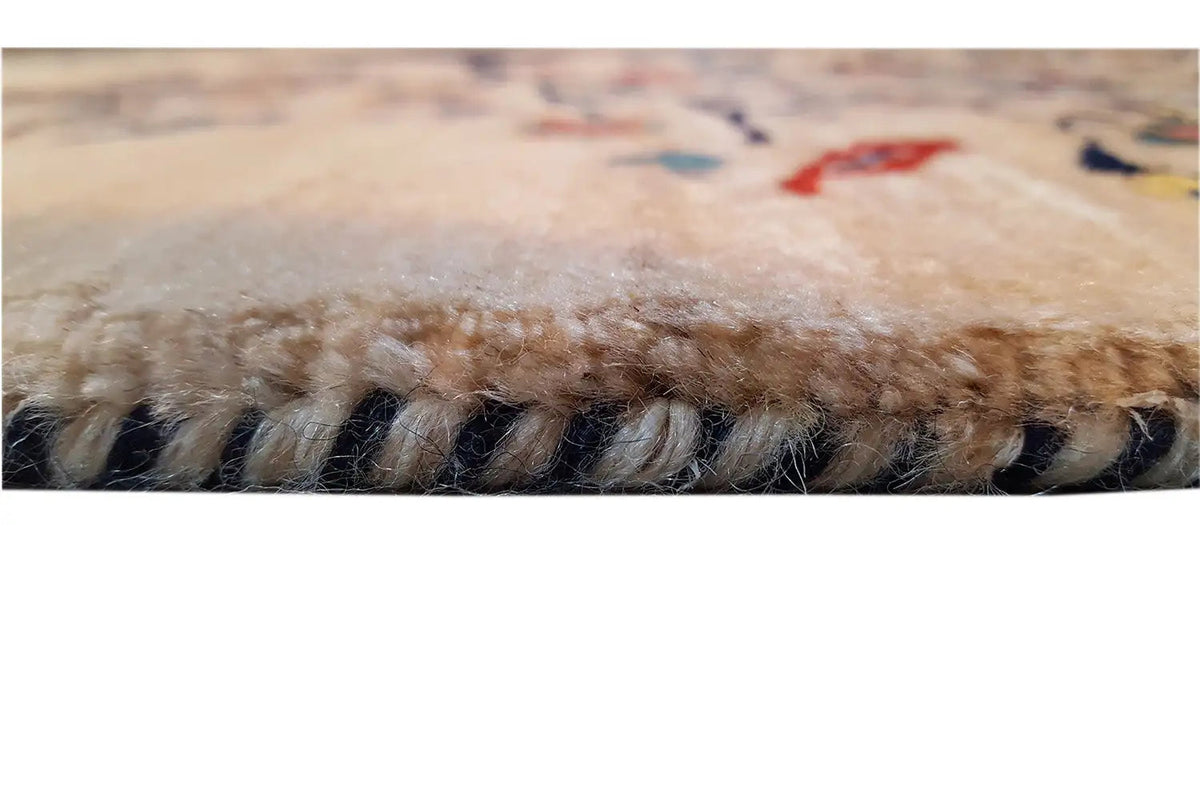 Rug: fringes along the edge, multicolored floral border