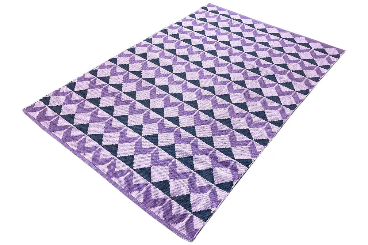 Folded kilim with a purple diamond and zigzag stripe pattern