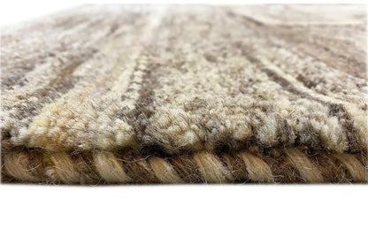 Gabbeh rug: close-up of the pile cut, soft beige-gray rug edge