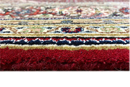 Indo Tabriz rug finishing edge with multicolored border and fringe