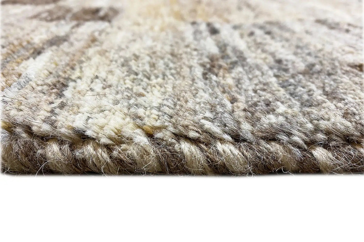 Gabbeh rug close-up: soft pile in light beige and brown tones