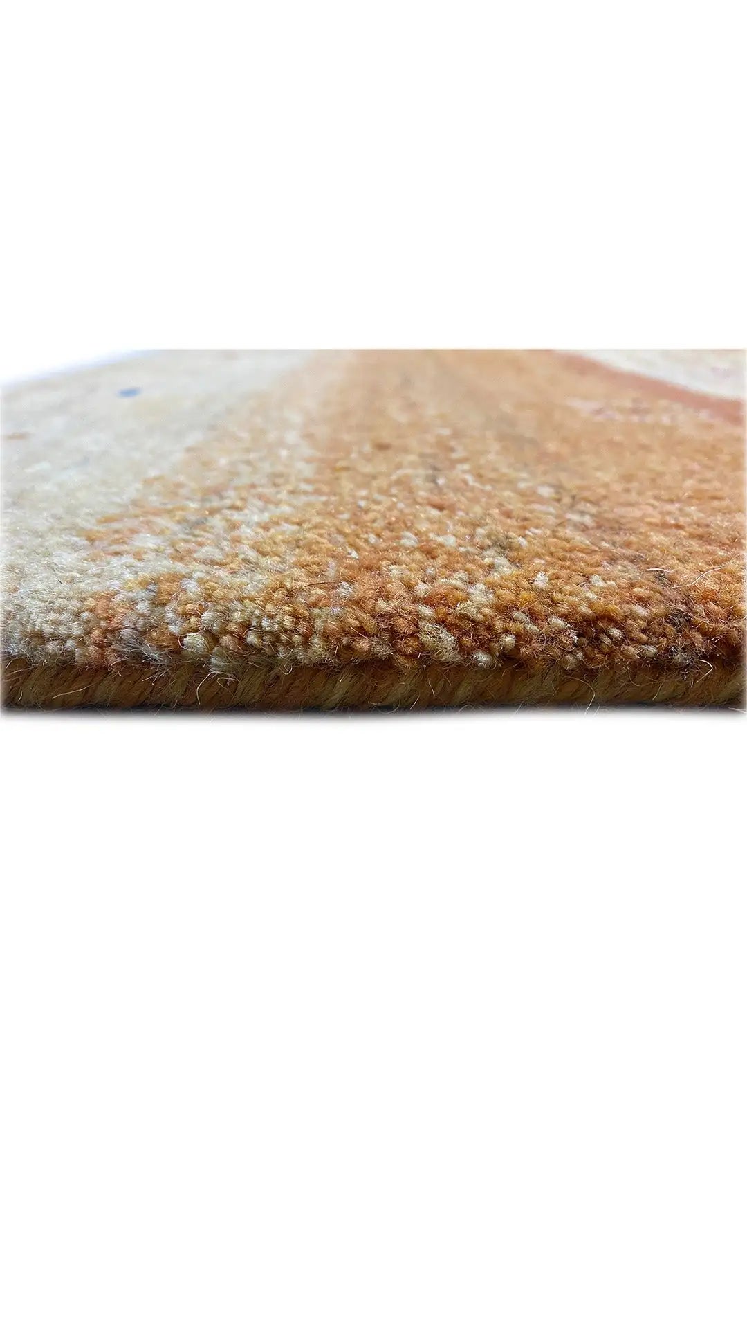 Gabbeh rug, close-up of the pile surface in warm brown-beige tones
