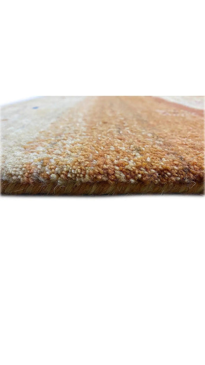 Gabbeh rug, close-up of the pile surface in warm brown-beige tones