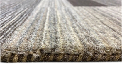 Gabbeh rug close-up: short pile, twisted texture, and multicolored stripes near the edge