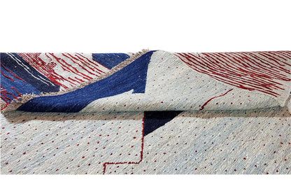 Kilim rug detail with dots, red lines, and blue areas