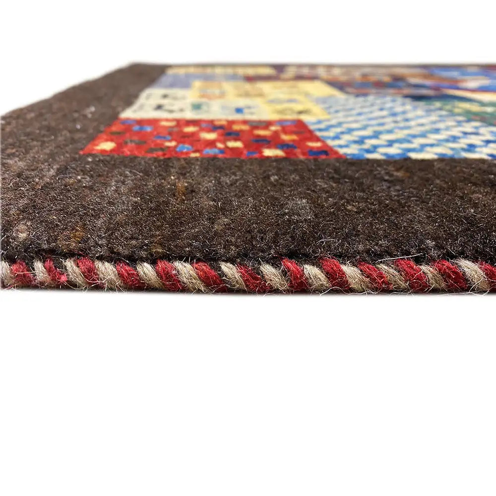 Gabbeh rug with bound edge and multicolored fringed finish