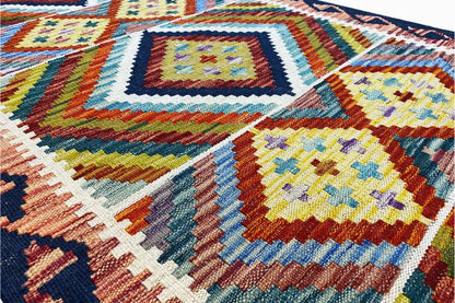 Kelim Afghan runner: close-up of the multicolored pattern and dense weave structure