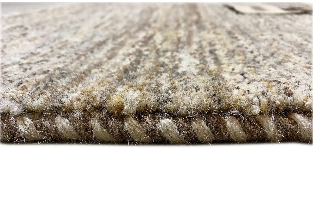 Gabbeh rug 244x173 cm detail view: pile and edges in a light gray-beige tone