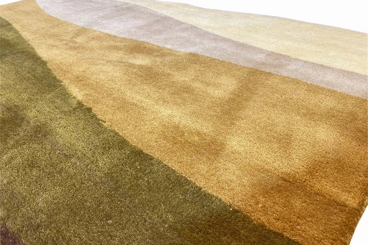 Hand-tufted rug 150x200 cm Detail: pile with beige-yellow and gray wavy stripes