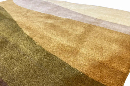 Hand-tufted rug 150x200 cm Detail: pile with beige-yellow and gray wavy stripes