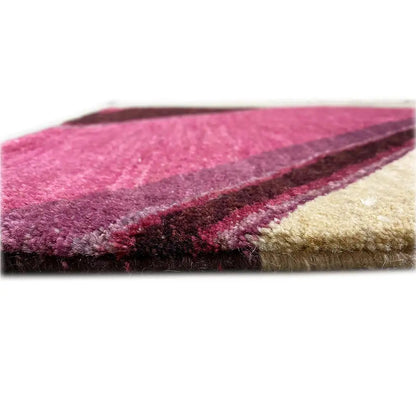 Gabbeh rug edge view with multicolored diagonal stripes and dense pile