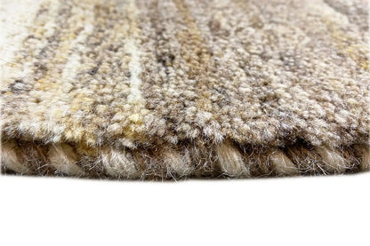 Carpet pile with a dense, multicolored texture; edge finish visible