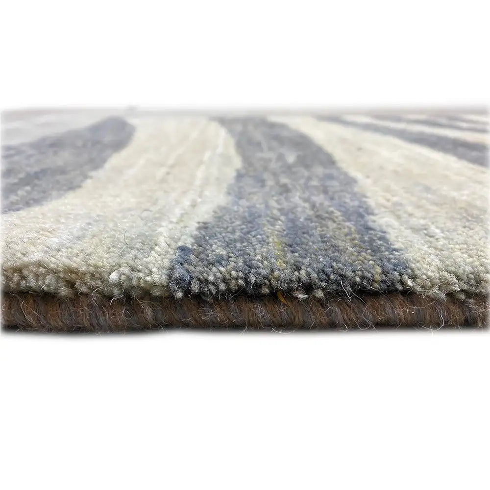Rug edge with short pile; blue-gray and beige stripes, woven underside