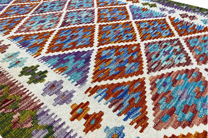 Close-up: kilim with colorful diamonds and lines, multicolored woven fabric