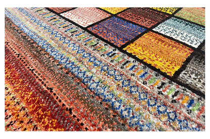 Gabbeh Lori rug, close-up of the woven fabric with colorful squares and stripes