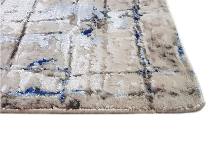 Carpet edge with light pile and blue grid pattern, detail