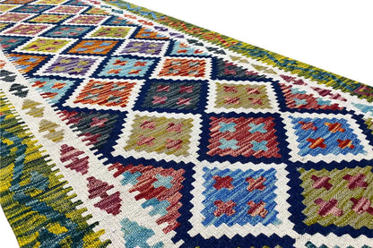 Kilim runner detail with colorful diamonds and a dense weave structure