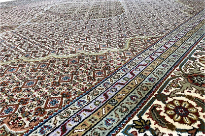 Close-up: dense carpet with a small-scale ornamental pattern in brown, cream, blue, and red