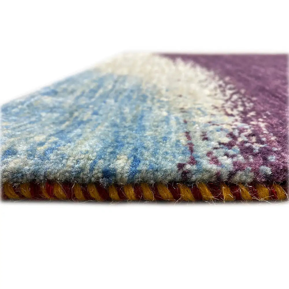 Gabbeh rug with fringes: purple, blue and beige pile at the edge