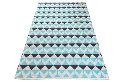 Modern kilim rug with stripes of diamonds and zigzags in blue, rectangular
